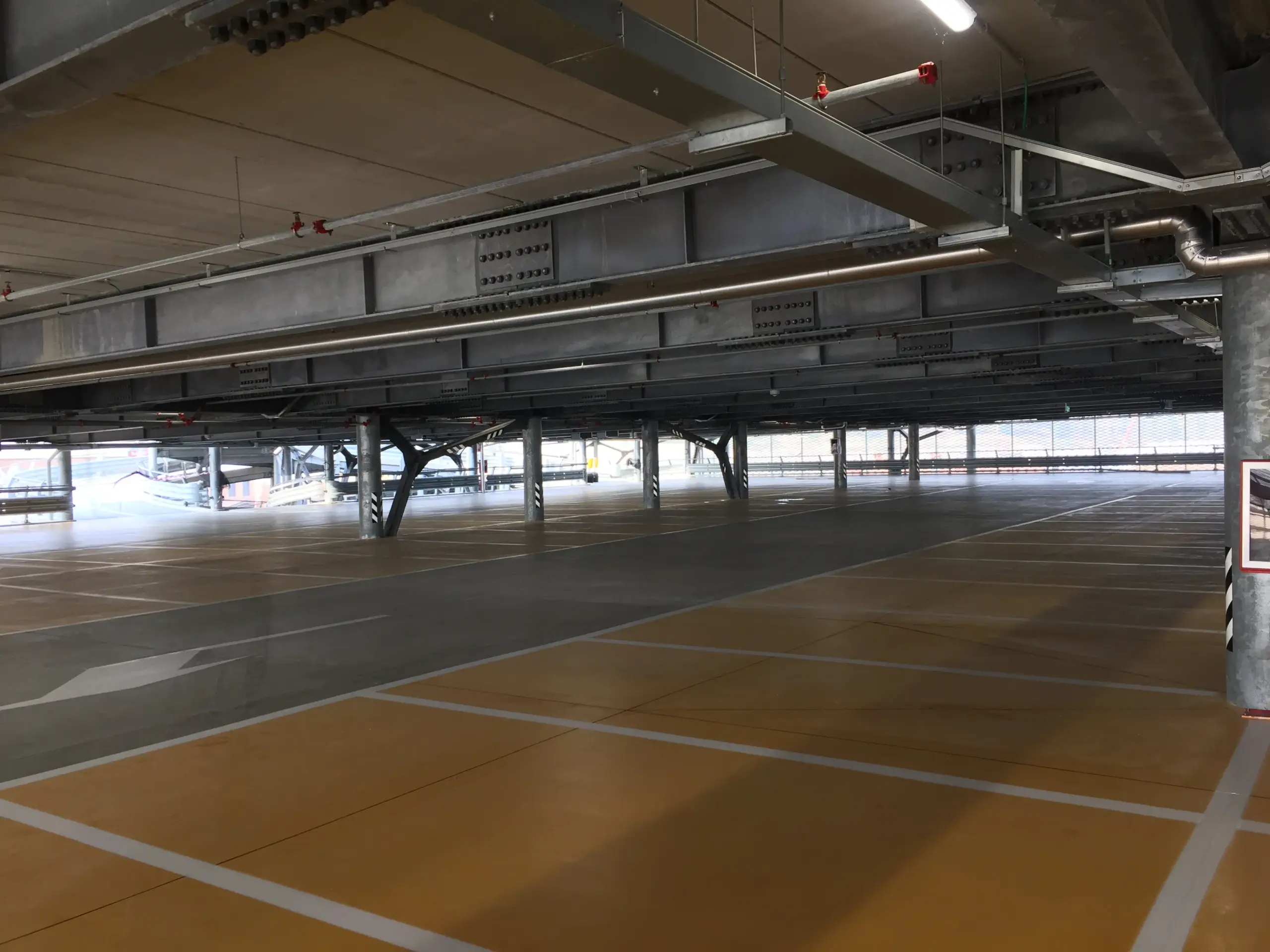 Pavimenti in resina MAPEFLOOR PARKING SYSTEM ID per il Parking di Serravalle Outlet