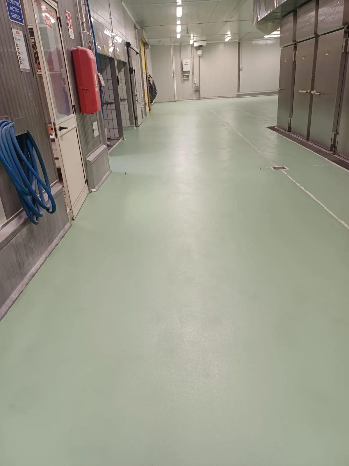 Salumificio Scarlino- Sistema di pavimentazione in cemento poliuretanico, autolivellante, sabbia di quarzo, resina
